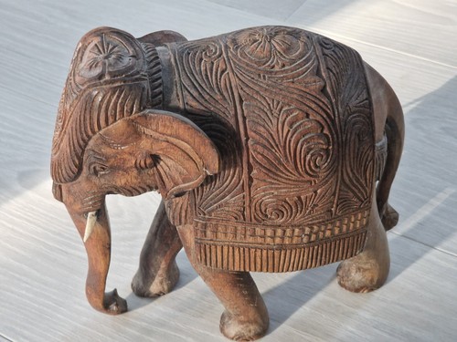 Intricately carved wooden - intricately,