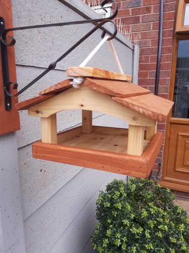 Hanging wooden bird feeder