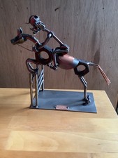 Hina & kunse metal sculpture, horse, rider & jump