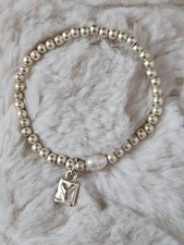ladies bracelet champagne colour pearl style.  Lovely piece of costume jewellery