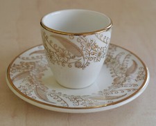 ARKLOW IRELAND EGG CUP AND PLATE/SAUCER - WHITE WITH GOLDEN FLOWER LEAF PATTERN