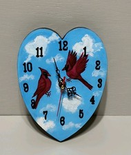 Heart-Shaped Clock with Red