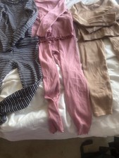 Four Items . 3 Top And Bottom Sets. One Trousers Suit. Size 6-8 years.