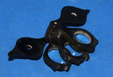 A useful antique 19th century triple lens loupe magnifying glass, bakelite type