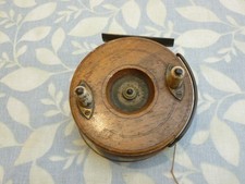 Fishing reel, vintage, wooden,  brass star back