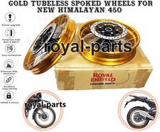 "GOLD TUBELESS SPOKED WHEELS"