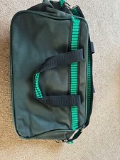 GREEN LUGGAGE BAG WITH CARRY HANDLES