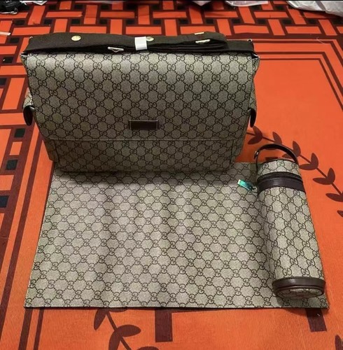 Gucci baby changing bag - gucci,