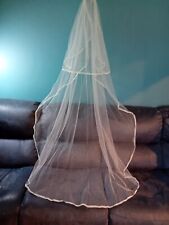 Ivory 2 tier chapel length veil with comb slide lace edge V406