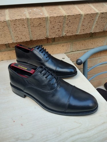 Russell and bromley black - and,