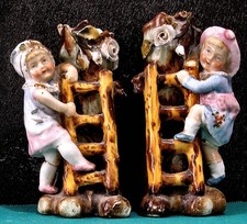 Pair of Conta & Boehme Victorian Fairings as Spill Vases  Boy & Girl on Ladders