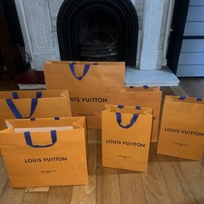 100% Louis Vuitton Gift bags various styles and sizes.