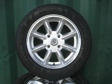 MGB SET OF 4 ALLOY WHEELS 5.5 X 15 SILVER  FITTED 185 T AVON TYRES