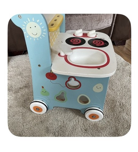 Toy kitchen and toddler - toy,