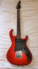 Aria Pro II The Cat, Metallic Red, 1986. Body in superb condition, with gig bag.