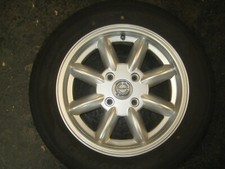 SET OF FOUR MGB GT ROADSTER INC V8   5.5 X 15 SILVER  ALLOY WHEELS & TYRES