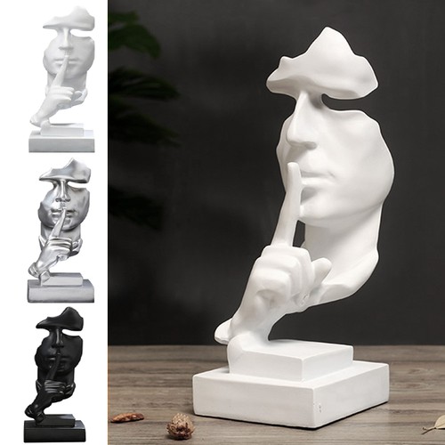 Silence golden face statue - is,
