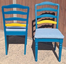 set of 2 dining chairs, Dark Teal and Orange accents.  Upcycled and reupholsterd