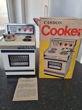 Vintage Casdon 1970`s toy cooker with original worn box.