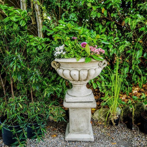 Large oval urn and - urn, plinth