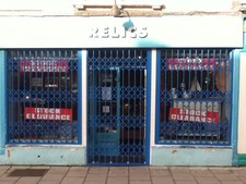 RETRACTABLE SECURITY GRILLES -