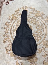 Brown Acoustic Guitar (Must Be