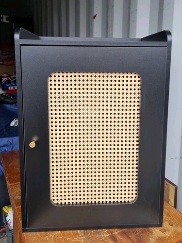 Black and rattan freestsnding - and,