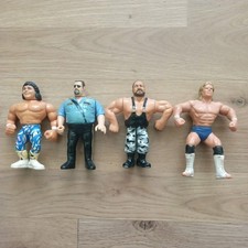 4 Unboxed WWF/WCW 12cm Figures