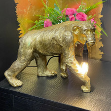 Walking Monkey Holding a Bulb