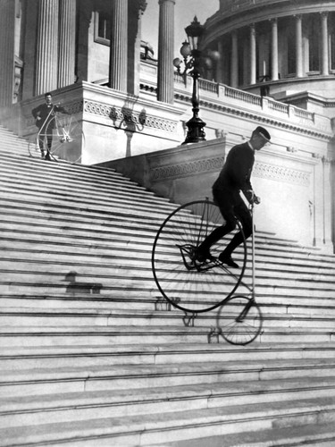 Vintage biking down - down, stairs