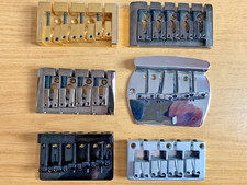 Job lot, 4 & 5 String bass guitar bridges gold, chrome, black, metallic, silver.