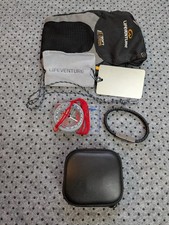 "Goody bag" with hiking/outdoors items including head torch, compass and mirror.