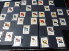 COLLECTION OF 32 SILK