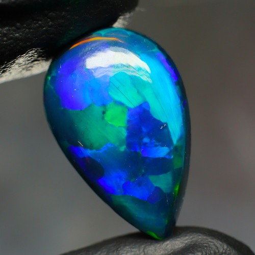 Black opal cabochon ct - 7.70,