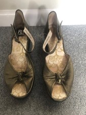 Fly gold sandals. Size 6