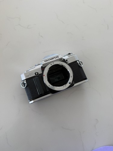 Olympus 35mm slr film - om-30,