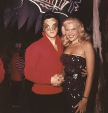 Elvis Presley wearing gold