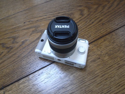 Pentax camera with zoom lens - with,
