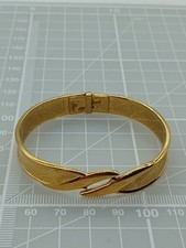 Monet Gold Tone Textured Clamper Style Hinged Bracelet