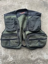 Here We Have A Green Medium Sized Fishing Vest with Pockets