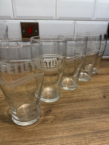 Tetley pint glasses - tetley's,