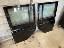 Land Rover Defender Tdci PUMA genuine Second Row doors Pair 110