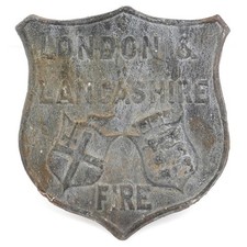 A reproduction 'London & Lancashire' style shield shaped lead fire mark