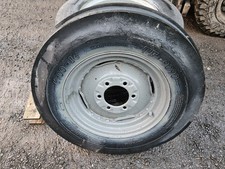 IMPLEMENT/TRACTOR FRONT WHEEL AND TYRE, SUPREME 6.00 x 16 THREE RIB TYRE.