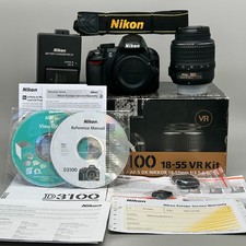 Nikon D3100 DSLR + 18-55mm VR Lens + Charger + Strap – 4958 Shutter Count