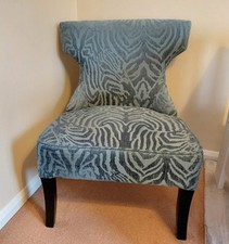 Deeply Padded Chair Upholstered In A Teal Zebra Print Fabric