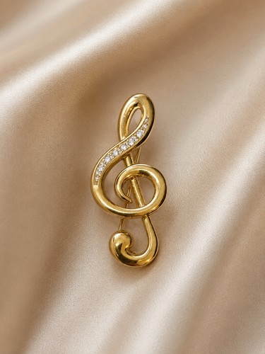 Vintage gold tone treble - treble, clef