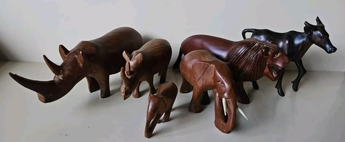 Wooden carved animals - carved, rhino