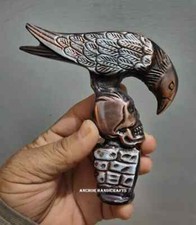 Raven On Skull Head Antique