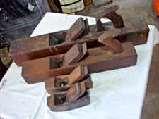 FOUR  ANTIQUE  WOOD  PLANES